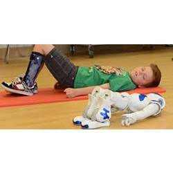 Royal Children's Hospital patient Miles workes with Nao.