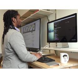 Computer scientist Jason Mars at work.