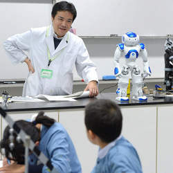 A humanoid robot equipped with an artificial intelligence helps a teacher with a science class at Keio University Kindergarten in Shibuya Ward, Tokyo, Japan.