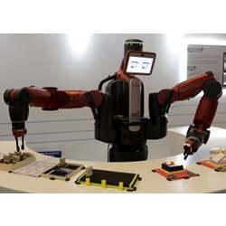 A robot touching and pushing objects to learn them.