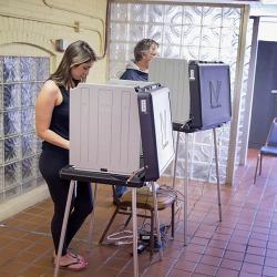 Voters cast their ballots at a polling place on May 3 in Whiting, IN.