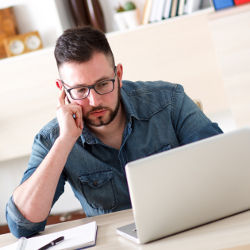 man at computer