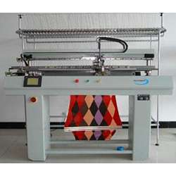 A semiautomatic single-bed flat knitting machine.