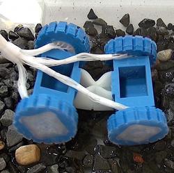 The wheeled robot with soft rotary motors.