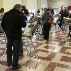 Ohio citizens using electronic voting machines during the 2012 U.S. presidential election.