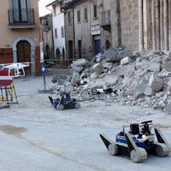 Two unmanned ground vehicles and two unmanned aerial vehicles at the San Francesco church in Amatrice, Italy. 