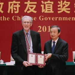 John Hopcroft receiving China's Friendship Award in Beijing.