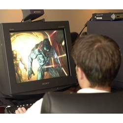 An id Software Inc. staff member battles a monster in the 2004 release of the Doom videogame.