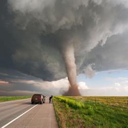 A tornado-watcher captures data on a funnel cloud.
