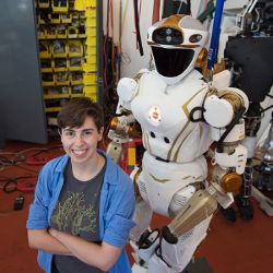 MIT's Sarah Hensley and Valkyrie, a humanoid robot