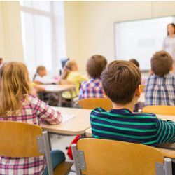 students and teacher in classroom