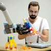 Robot Learns to Play With Lego By Watching Human Teachers