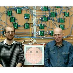 Richard Grafton (left) and David May in front of the Big Hex Machine. 