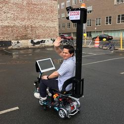 The autonomous mobility scooter in use. 