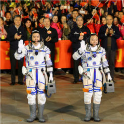 Astronauts Chen Dong and Jing Haipeng