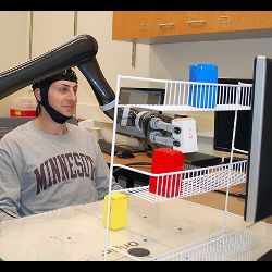 research subject wearing noninvasive brain cap