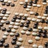 Google Reveals Secret Test of AI Bot to Beat Top Go Players