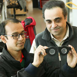 University of Utah electrical and computer engineering professor Carlos Mastrangelo, right, and doctoral student Nazmul Hasan with the smart glasses.