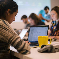 Volunteers work to identify and download datasets from U.S. government websites at the Tisch School of the Arts at New York University in New York. 