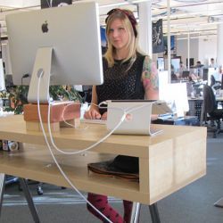 worker at stand-capable desk