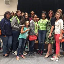 Alicia Abella, who is on the President's Advisory Commission on Educational Excellence for Hispanics, with girls she met at the conference.