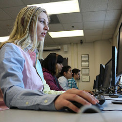 Female students gathering in the University of Rochester computer science majors lab.