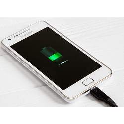 A smartphone charging.