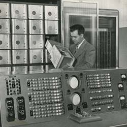 Harry Huskey, circa 1950, with an early computer prototype. 