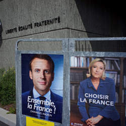 Posters for Emmanuel Macron and Marine Le Pen in advance of Frances presidential runoff election.