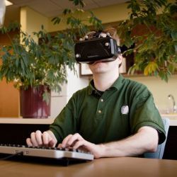 keyboard typist wearing Oculus Rift