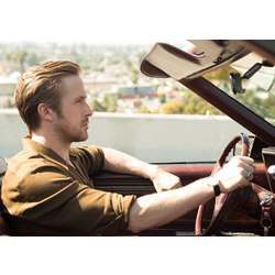 A human driver (Ryan Gosling in the film La La Land). 