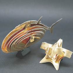 Self-folding three-dimensional models of a tuna and a starfish.