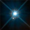 Hubble Sees Light Bending Around Nearby Star