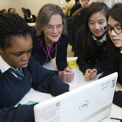 Girls learning to code.