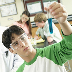 male student in lab