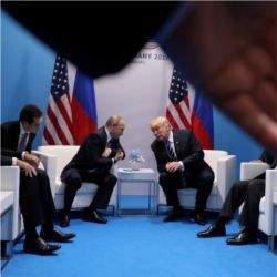 Vladimir Putin and Donald Trump meet