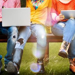 students with laptops, illustrative photo