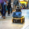 Robot Rolls With the Rules of Pedestrian Conduct