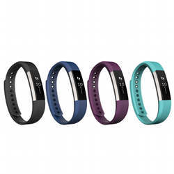 Several Fitbit wearable activity trackers. 