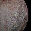 Gigantic Ice Spikes on Pluto Trace Climate