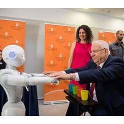 Demonstrating physical therapy for Israeli president Reuven Rivlin.