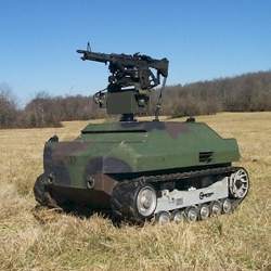 A weapon-bearing armored unmanned ground vehicle.