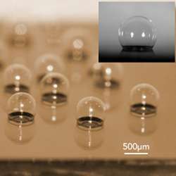 Chip-scale glass microspherical shell sensor array blown on a silicon substrate. Insert is a near-perfect spherical shell.