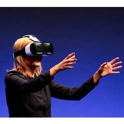 A user wearing a Samsung Gear VR virtual reality headset.