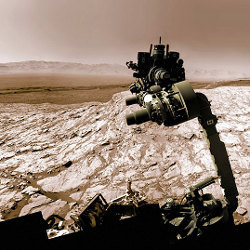 Curiosity rover with raised robotic arm