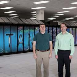 Oak Ridge researchers Steven Young (left) and Travis Johnston with the Titan supercomputer.