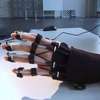 Feedback Enhances Brainwave Control of a Novel Hand-Exoskeleton