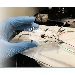 The new three-dimensional bioprinter has two key components: a microfluidic chip (shown) and a digital micromirror.