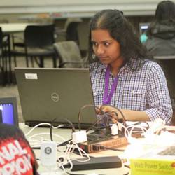 A Girl Scout practices hacking.