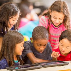 children using computer tablets